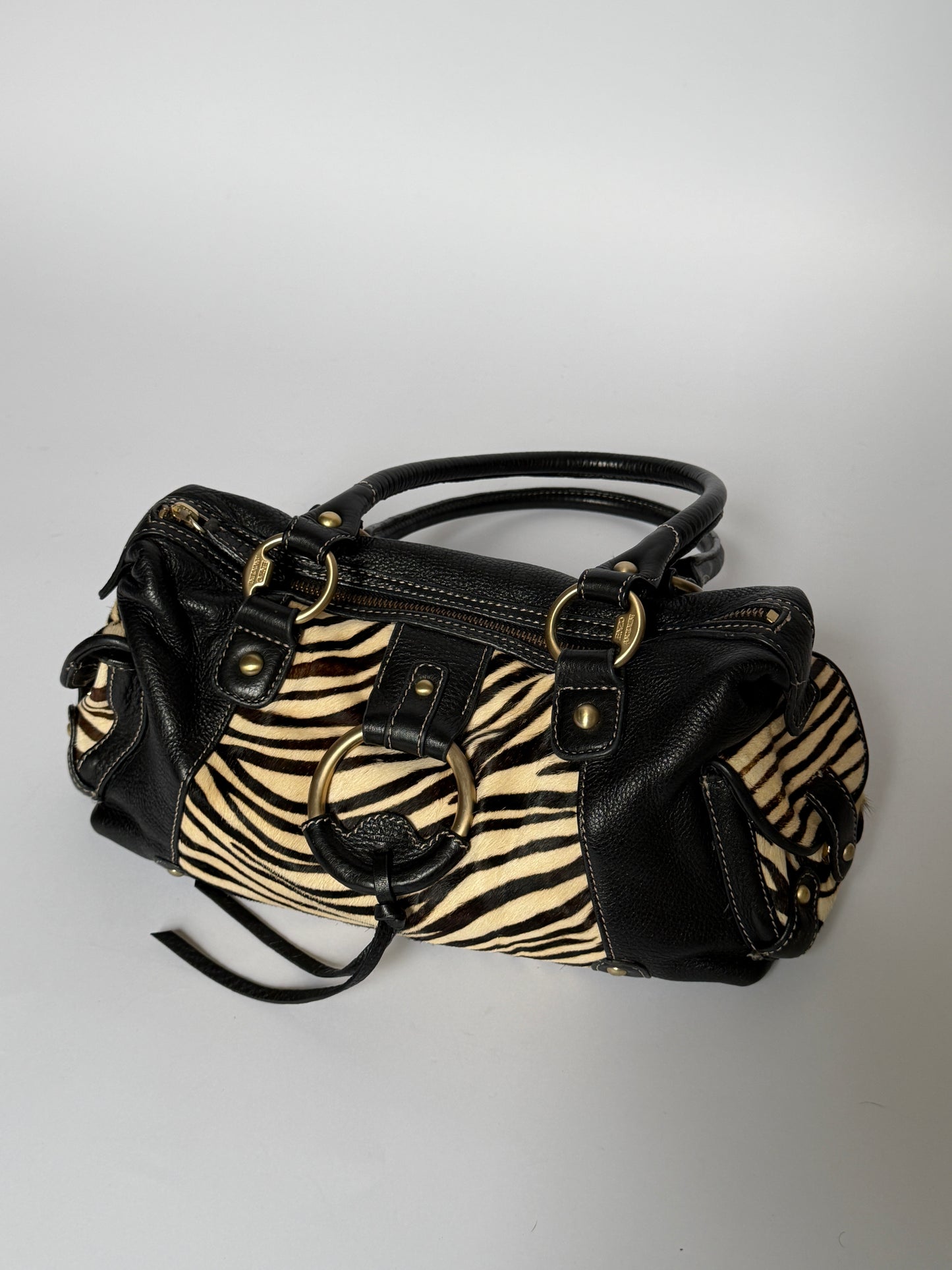 Vintage Enzo Angiolini zebra print pony hair and black leather barrel bag — view 2