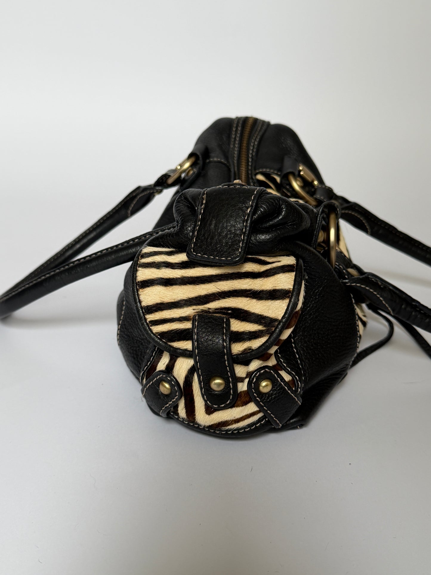 Vintage Enzo Angiolini zebra print pony hair and black leather barrel bag — view 5