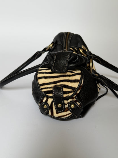 Vintage Enzo Angiolini zebra print pony hair and black leather barrel bag — view 5