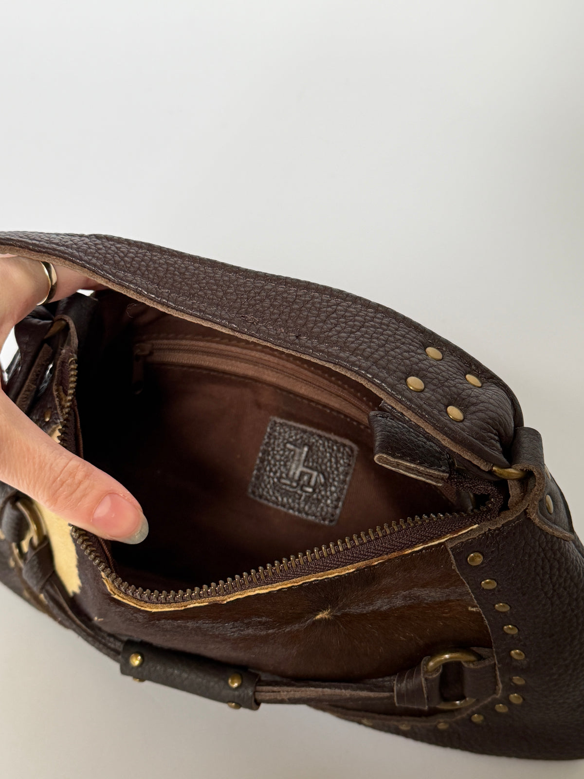 Leather & Cowhide Shoulder Bag with Equestrian Buckle Detail