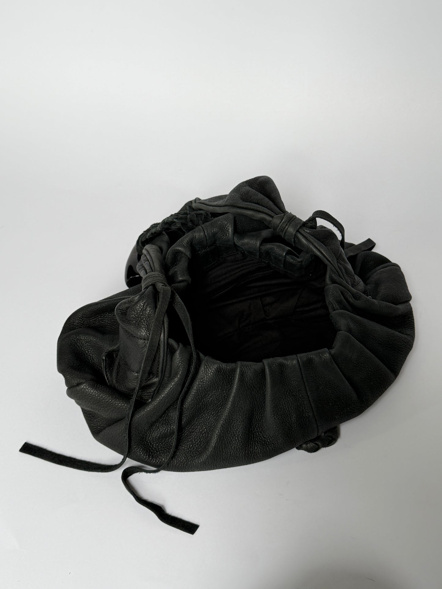 Black Braided Leather Shoulder Bag — Horn Detail