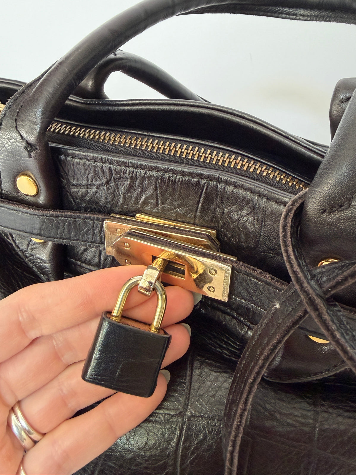 Black Croc-Embossed Leather Satchel with Gold Lock Detail