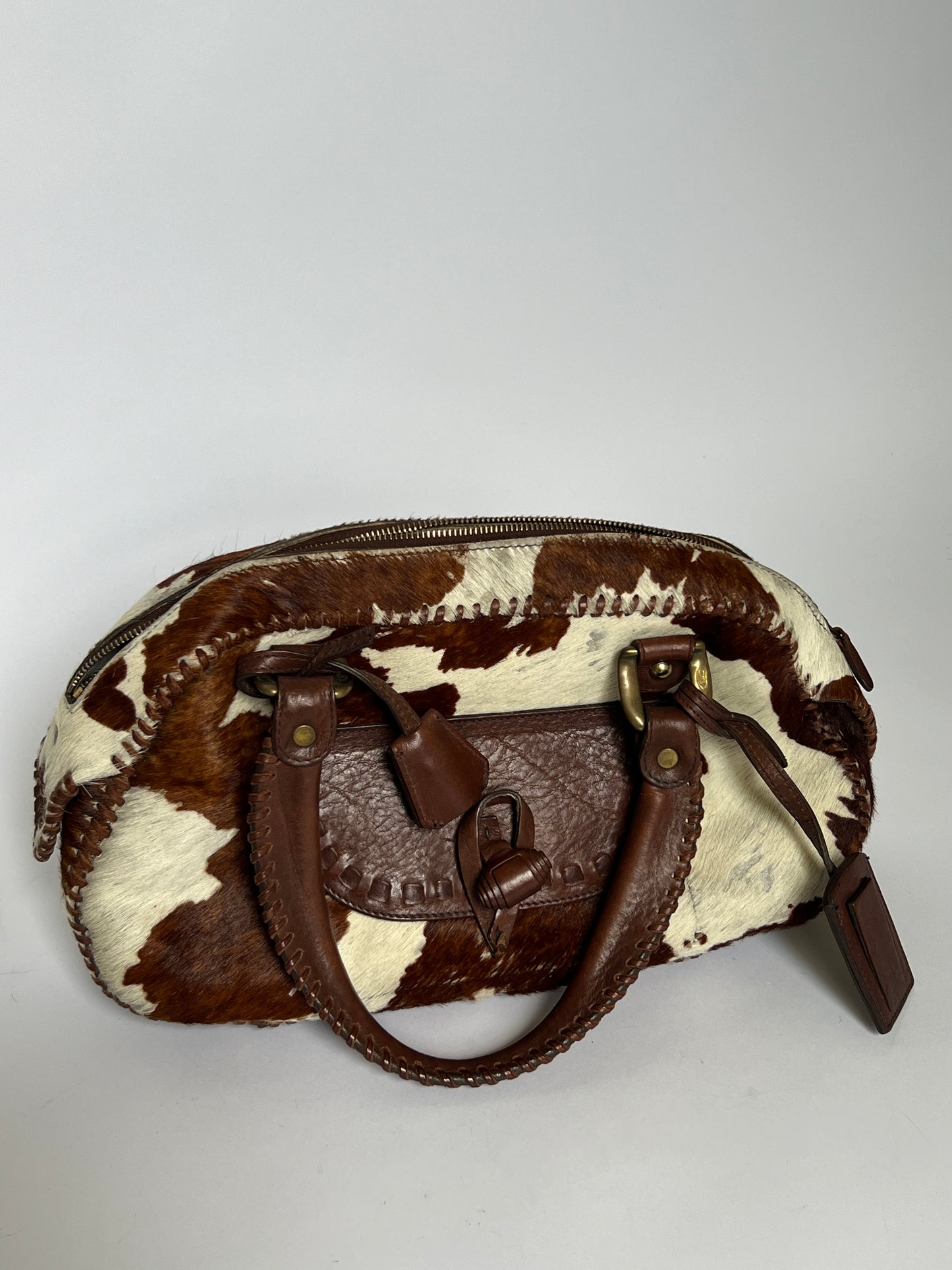 Lock and Key Cowhide Bag