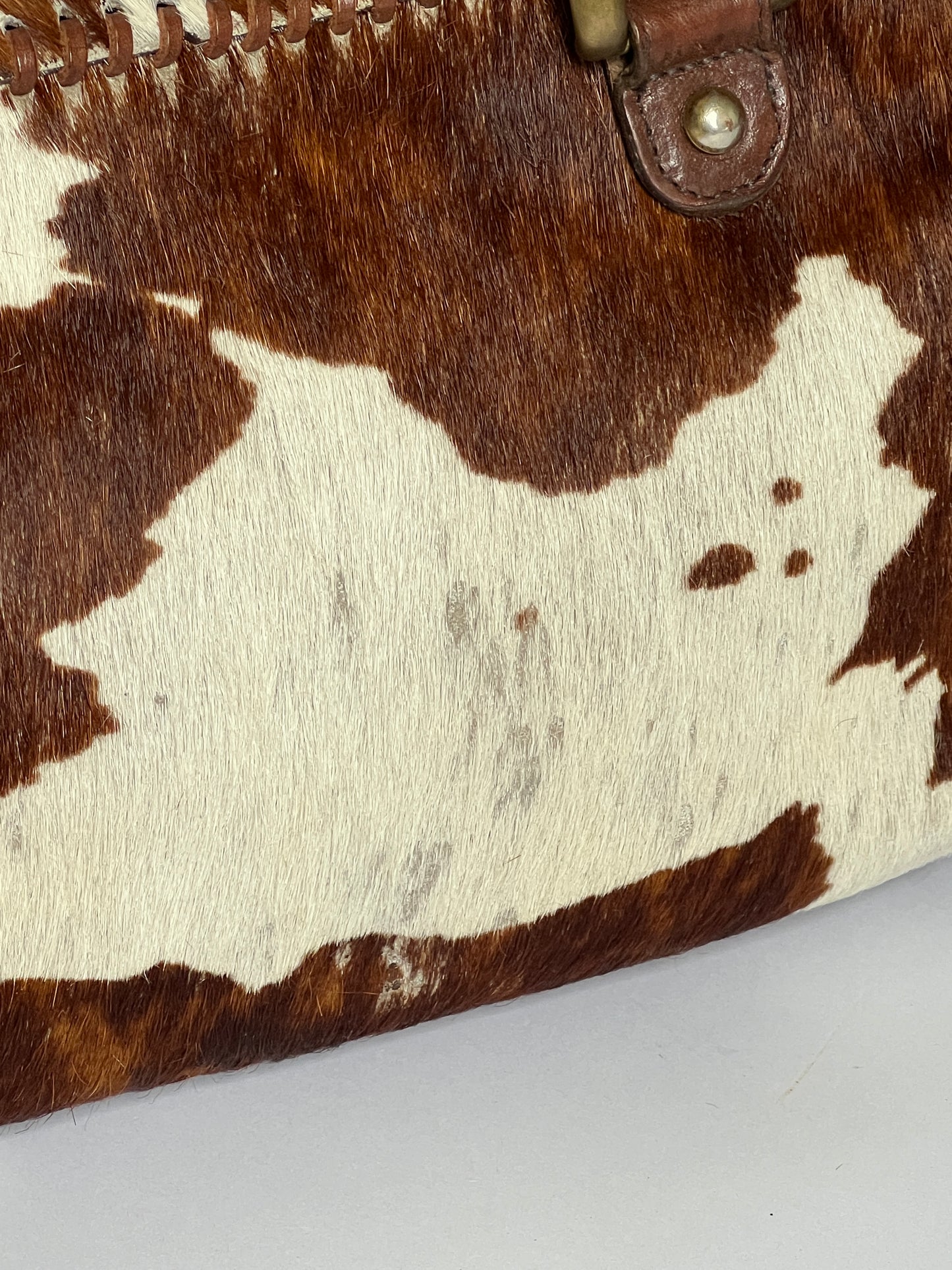 Lock and Key Cowhide Bag