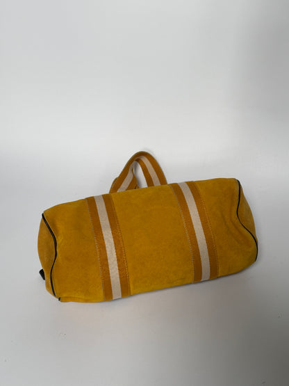 Yellow Suede Drum Bag with Striped Straps