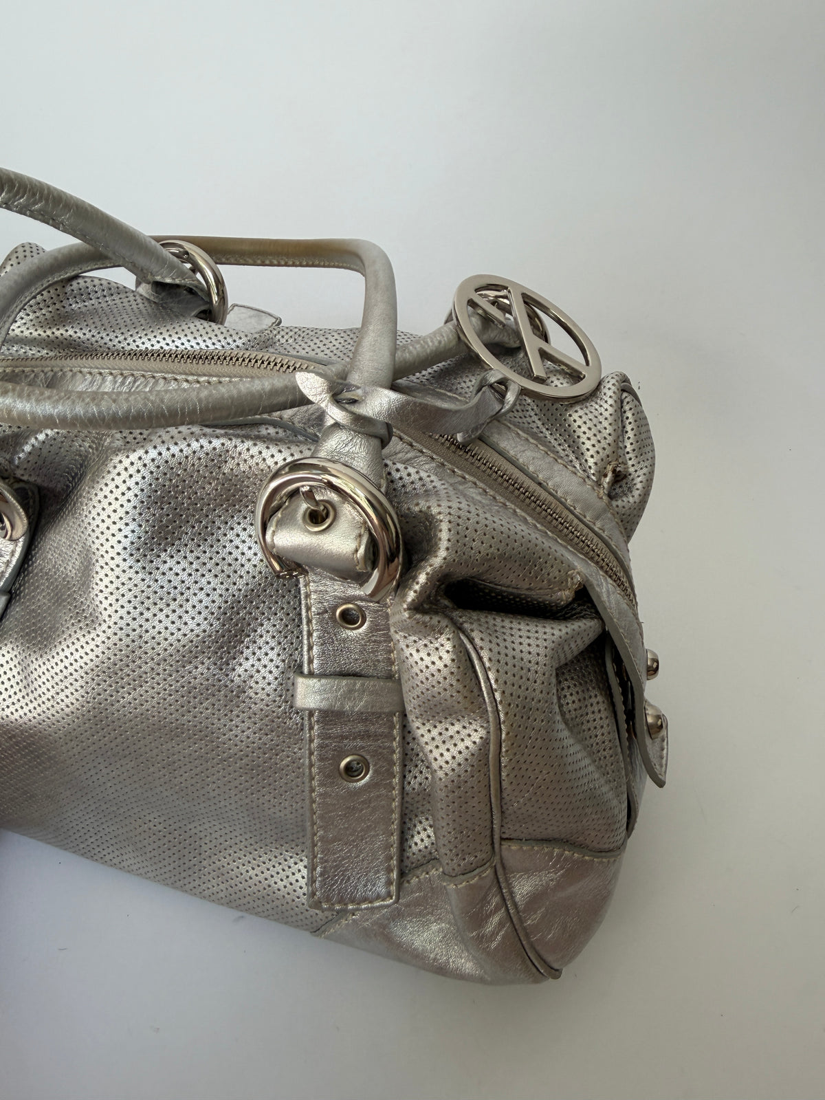 Silver Leather Shoulder Bag with Buckle Straps and Logo Charm