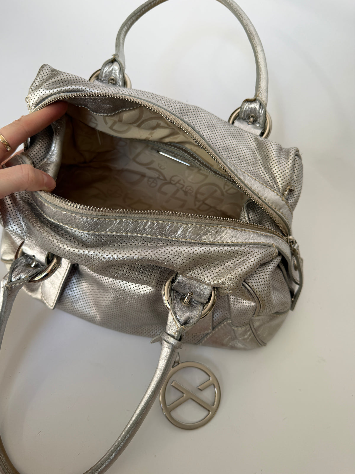 Silver Leather Shoulder Bag with Buckle Straps and Logo Charm