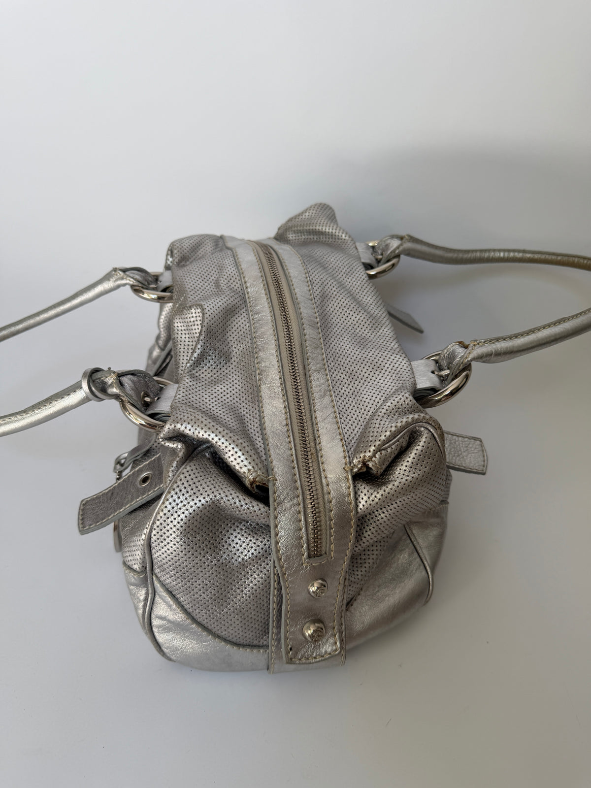 Silver Leather Shoulder Bag with Buckle Straps and Logo Charm