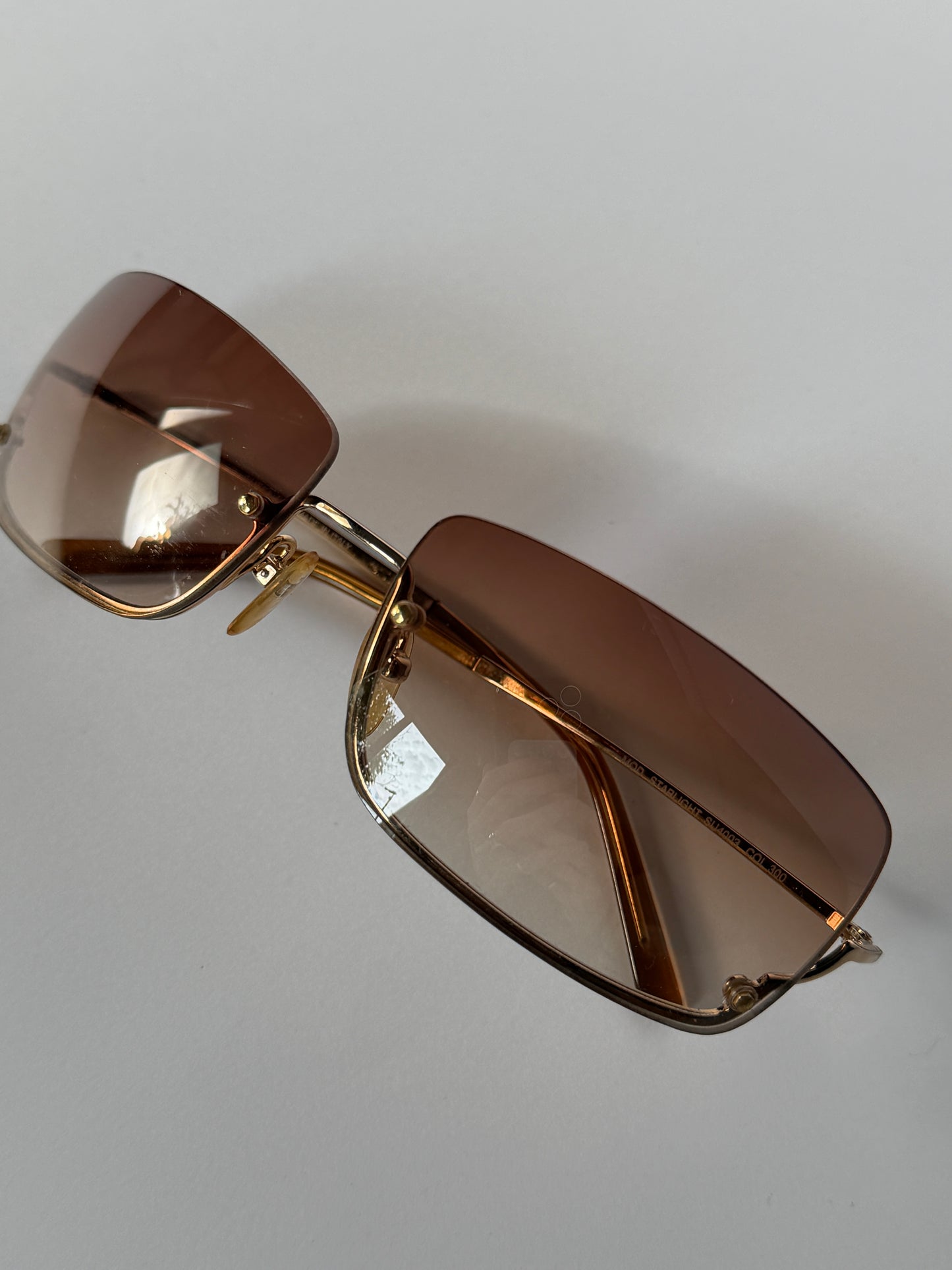 Furla Gold Starlight Rimless Sunglasses